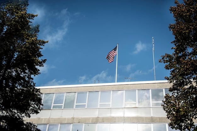 A government office building with American flags waving in front, representing the administrative aspect and policy backing of renewable energy subsidy programs. The image conveys the idea of official support and regulatory frameworks that govern renewable energy incentives.