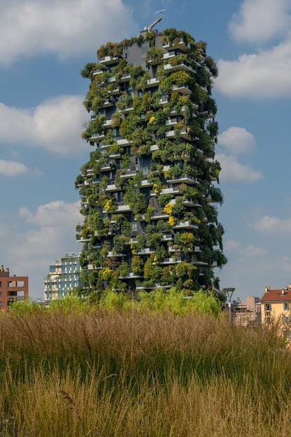 A collage of images showcasing various environmental sustainability initiatives across the US, including community gardens, electric vehicle charging stations, recycling programs, and green buildings.