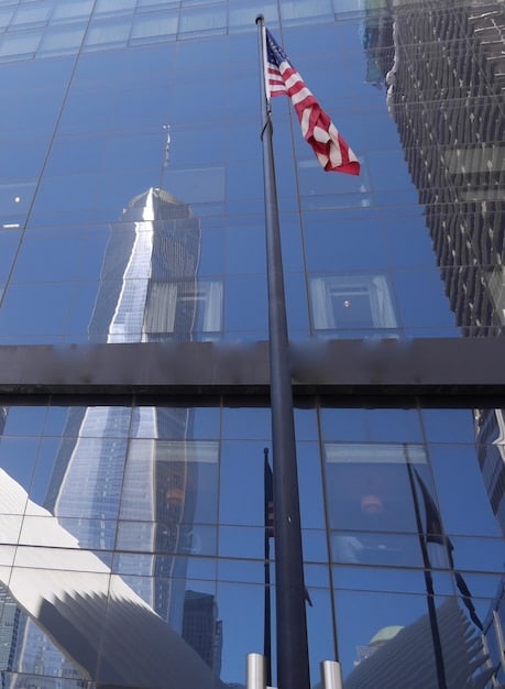 A visual depiction of the UN headquarters in New York City, highlighting its importance as a center for global diplomacy. The image includes diverse representatives entering the building, symbolizing the multinational composition of the United Nations.