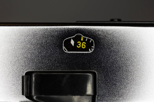 A close-up shot of an EnergyGuide label on a new refrigerator, clearly showing the estimated annual electricity cost and an energy consumption scale, with a human hand pointing to the Energy Star logo.