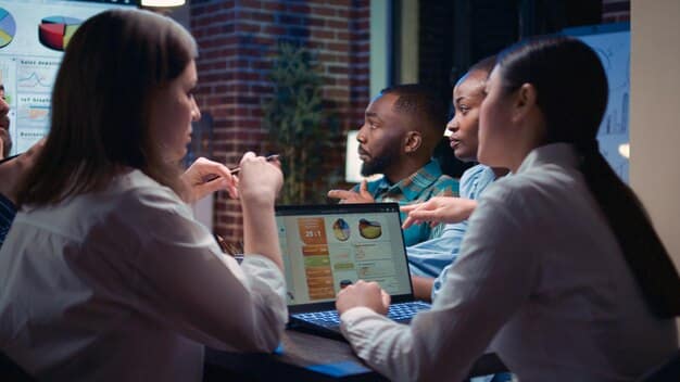 A diverse team of professionals collaboratively discussing data visualizations on a large screen, reinforcing the idea of data-driven team collaboration and presenting insights effectively.
