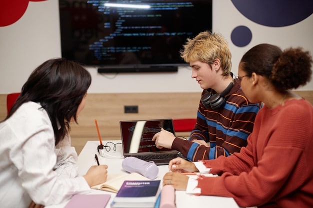 A group of high school students in a US school collaborating on a coding project, using laptops and working together around a table. The students are diverse and engaged, showcasing the importance of STEM education and teamwork in The Future of Education: How Technology is Transforming Learning in US Schools.