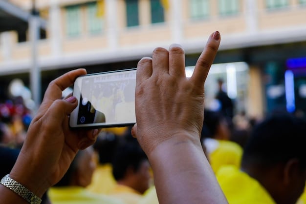 A close-up of a smartphone displaying a social media campaign advocating for racial equality. The hashtags are visible, and the image evokes a feeling of solidarity and collective action facilitated by technology in the context of