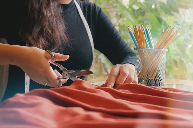 A close-up shot of a sewing kit with hands mending a garment, symbolizing the importance of repair and extending clothing lifespan as a sustainable practice.