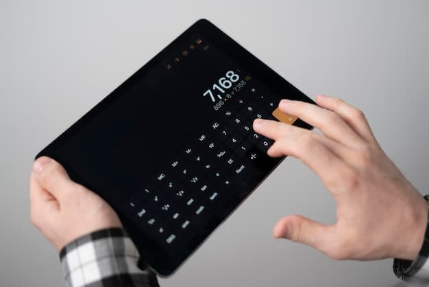 A close-up shot of hands, one holding a calculator and the other navigating a smart home energy app on a tablet, with a blurred background of a modern living room featuring energy-efficient appliances.