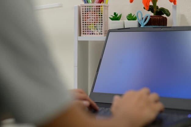 A close-up shot of a designer's hands using Figma on a large monitor. The screen displays a complex wireframe of a mobile app. Emphasize the detailing in the wireframe and the focused expression of the designer. This image illustrates the technical skills discussed in the Essential Skills section on How to Become a UX/UI Designer in 2025: A Practical Guide.